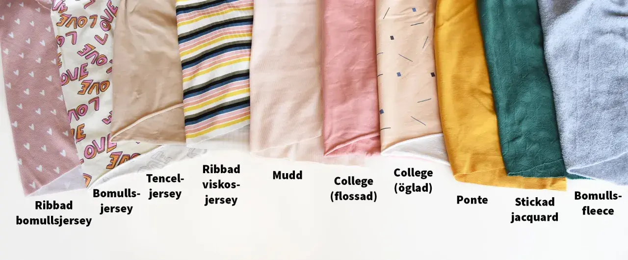 Olika tyger i rullar, från hjärtmönstrat bomullsjersey till stickad jacquard och bomulls-fleece. Vissa har fina stygn i kant.
